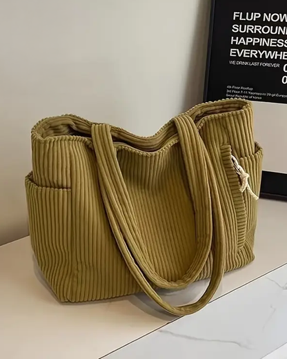 Hanna™ | Bolso de mano acanalado con detalle de cordón